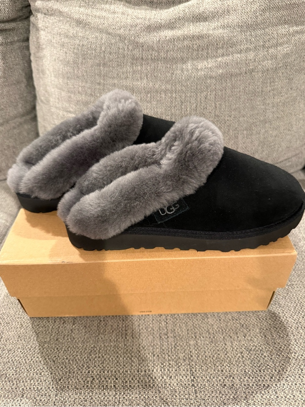 UGG Cluggette Women's Black Suede Slip-On Slippers with Gray Shearling Trim